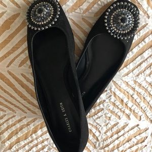 Black suede flat, beaded buckle.